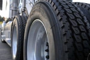 Truck Company Liability for Flying Tire Debris
